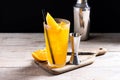 Orange vodka cocktail on wooden table Royalty Free Stock Photo