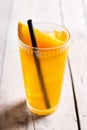 Orange vodka cocktail on wooden table Royalty Free Stock Photo