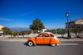 Orange Volkswagen Beetle Classic Car Parade in Tanneron, France