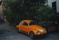 Orange Volkswagen Beetle old style car vintage style photography Royalty Free Stock Photo