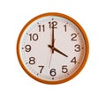 Orange wall clock isolated in four o'clock. Royalty Free Stock Photo