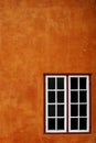 Orange wall and window Royalty Free Stock Photo