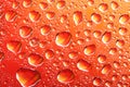 Orange water drops Royalty Free Stock Photo