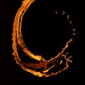 Orange water splash isolated on black Royalty Free Stock Photo