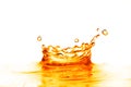 Orange water splash isolated on white Royalty Free Stock Photo