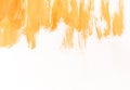 Orange watercolor brush strokes on white paper. Horizontal background with stains of watercolour paint. Royalty Free Stock Photo