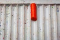 Orange wax crayon in an empty box Royalty Free Stock Photo