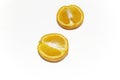 Two halves of an orange on a white background. Orange on white - bright halves of citrus. Royalty Free Stock Photo