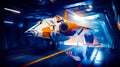 Orange and white fighter jet sitting on top of blue and yellow floor Royalty Free Stock Photo