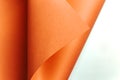 Orange and white flat lay background with sharp layers, curves and shadows with copy space Royalty Free Stock Photo