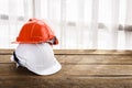 Orange, white hard safety helmet construction hat for safety pro Royalty Free Stock Photo