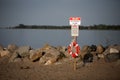 Life Preserver Saver Beach Swim Rocky Shore Royalty Free Stock Photo