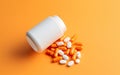 orange and white medicine supplement pill capsules with plastic bottle and clear background