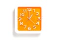 Orange White/Orange clock pointing at 1AM or 1PM