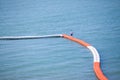 Orange and white plastic buoys in the sea Royalty Free Stock Photo