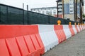 Orange and white plastic Jersey Barriers protect a construction Royalty Free Stock Photo