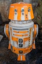 Orange and White R5 droid at Galaxy`s Edge