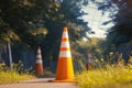 Orange and white street cone stands in forest background, cautionary Royalty Free Stock Photo