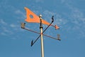 Orange wind vane Royalty Free Stock Photo