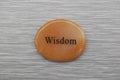 Orange Wisdom mood stone on gray background Royalty Free Stock Photo