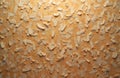 Orange wood chip texture osb board. Natural light illuminates compressed wood panel surface. Rough wooden material shows wood Royalty Free Stock Photo