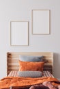 Orange wooden bedroom design, poster frame mockup