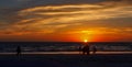 Summer sunset on the horizon across ocean Beach