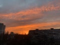 Orange, yellow, pink and red sunset. Rooftop view