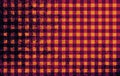 Orange yellow red brown black abstract checkered background with blur, gradient and grunge texture. Royalty Free Stock Photo