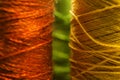 Orange and yellow sewing thread Royalty Free Stock Photo