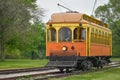 Orange and Yellow Trolley Train Car
