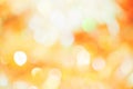 Orange, yellow and white bokeh light. Abstract or blurred of light glitter. Glow texture background.