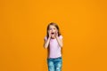 on orange young casual teen girl shouting at studio Royalty Free Stock Photo