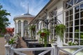 Orangery restaurant in Raudondvaris Lithuania, outdoor summer view Royalty Free Stock Photo