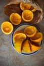 Oranges being squeezed for fresh orange juice Royalty Free Stock Photo
