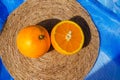 Oranges on a blue background top view