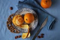 Oranges on a blue plate