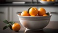 Oranges in a bowl on a kitchen table. Selective focus.
