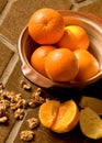 Oranges in a bowl on Spanish tile Royalty Free Stock Photo