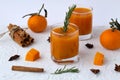 Fresh pumpkin juice drink on white table