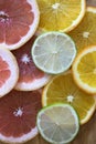 Oranges, lemons and grapefruits. Sliced fruit. Backgrounds and textures