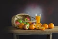 Oranges group freshly picked in a basket