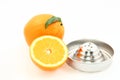 Oranges and juice extractor Royalty Free Stock Photo