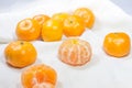 Oranges fruit on white fabric which as the background. Royalty Free Stock Photo