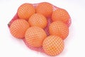 Oranges in a net Royalty Free Stock Photo