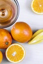 Oranges next to orange slices. Orange juice and oranges Royalty Free Stock Photo