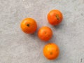 oranges placed on a white board