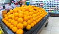 Oranges for sale in a supermarket aisle Royalty Free Stock Photo