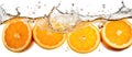 Oranges splashed and dropped in water Royalty Free Stock Photo