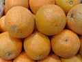 Oranges stack neatly for display at market